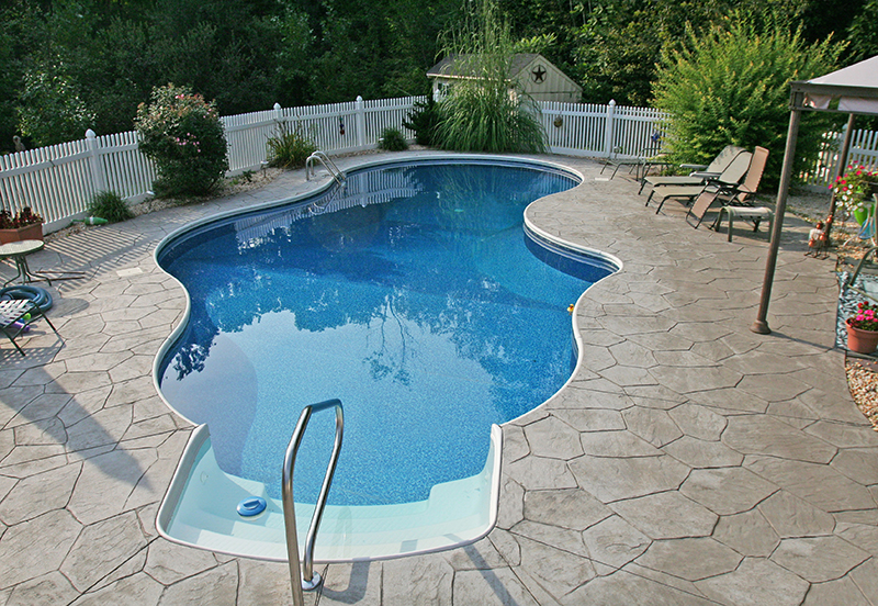 Swimming pool and stamped concrete project example 79